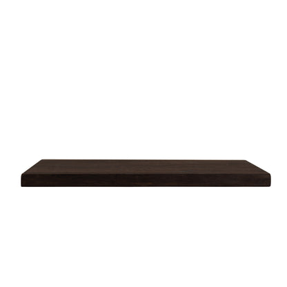Side view of solid dark oak floating shelf showing thickness