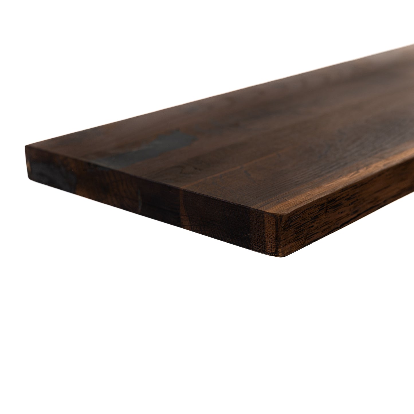 Dark oak live-edge floating shelf mounted on white wall