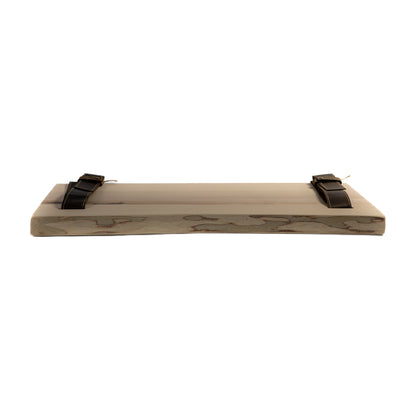 Side view of light pine shelf showing smooth oil-wax finish
